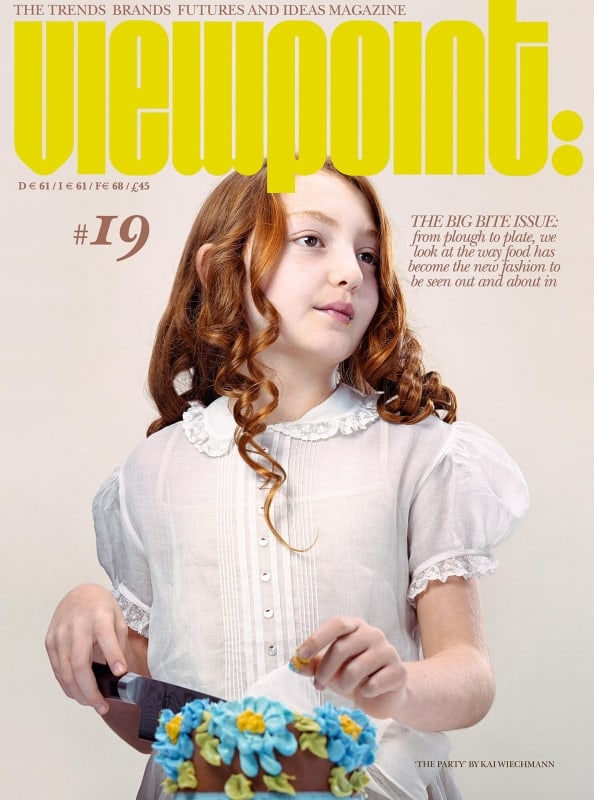 Kai Wiechmann Photography portrait red hair girl in white dress eating cake